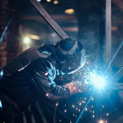 man-is-working-at-the-busy-metal-factory-e1693980680109.jpg